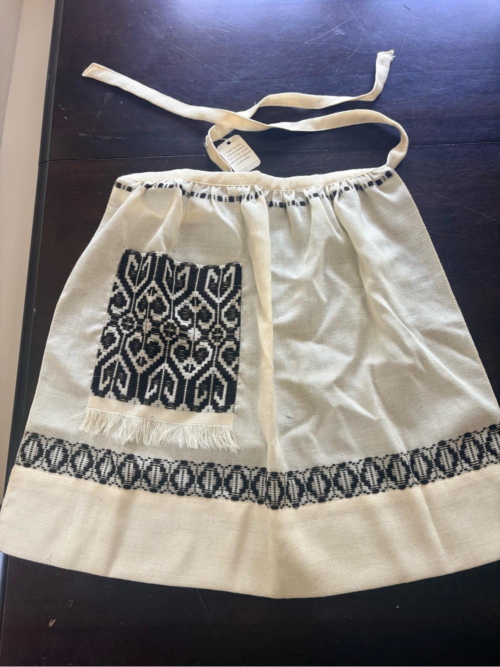 Arola 100% Wool Cream Apron with Black Geometric Pattern